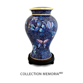 Blue copper urn, decorated with butterflies