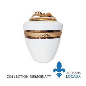 White urn with golden leaves